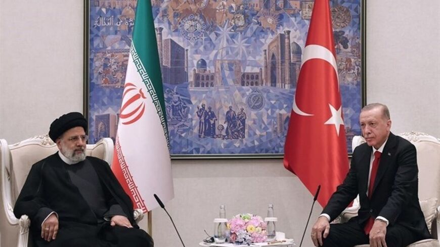 President Recep Tayyip Erdoğan shakes hands with Iranian President Ebrahim Raisi during a meeting in Samarkand, Uzbekistan, Sept. 17, 2022. 